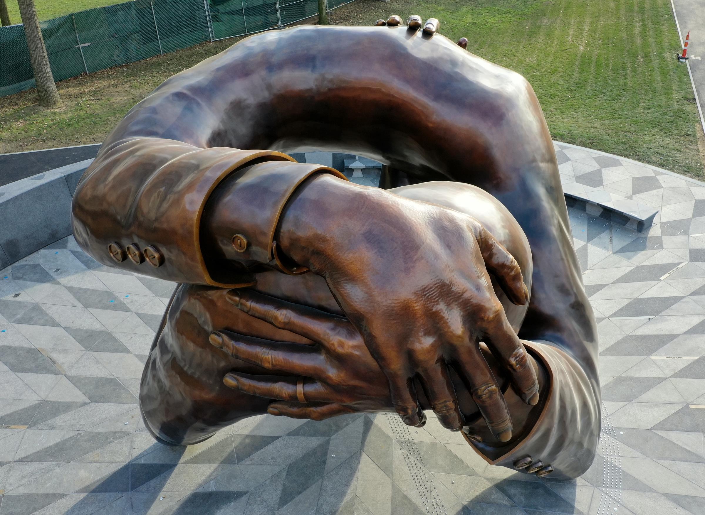 Photo of "The Embrace" memorial by Hank Willis Thomas, courtesy of Skanska