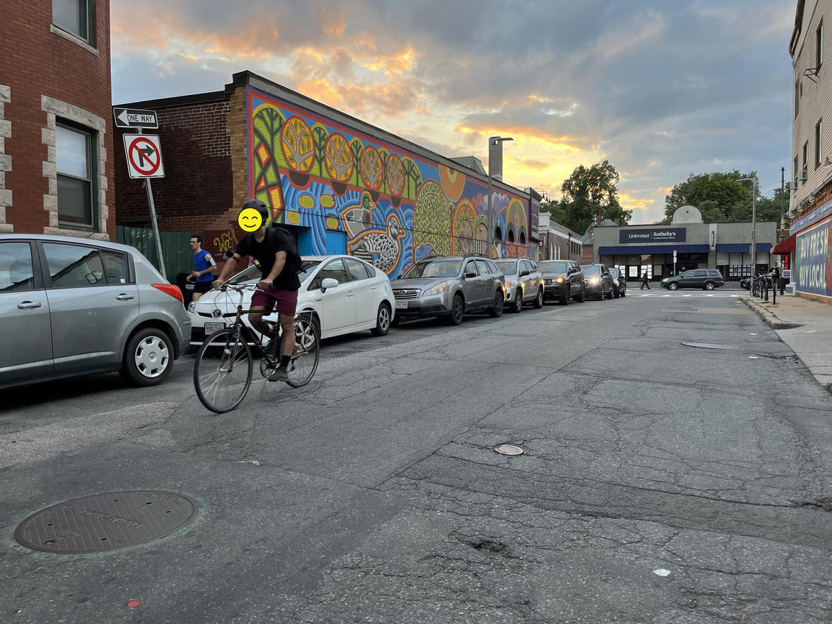 Photograph of a person biking on Seaverns Avenue
