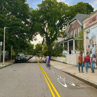 An artistic rendering of a contraflow bike lane on Eliot Street